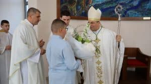 Krštenje petog djeteta roditelja Cunjek u Virovitici